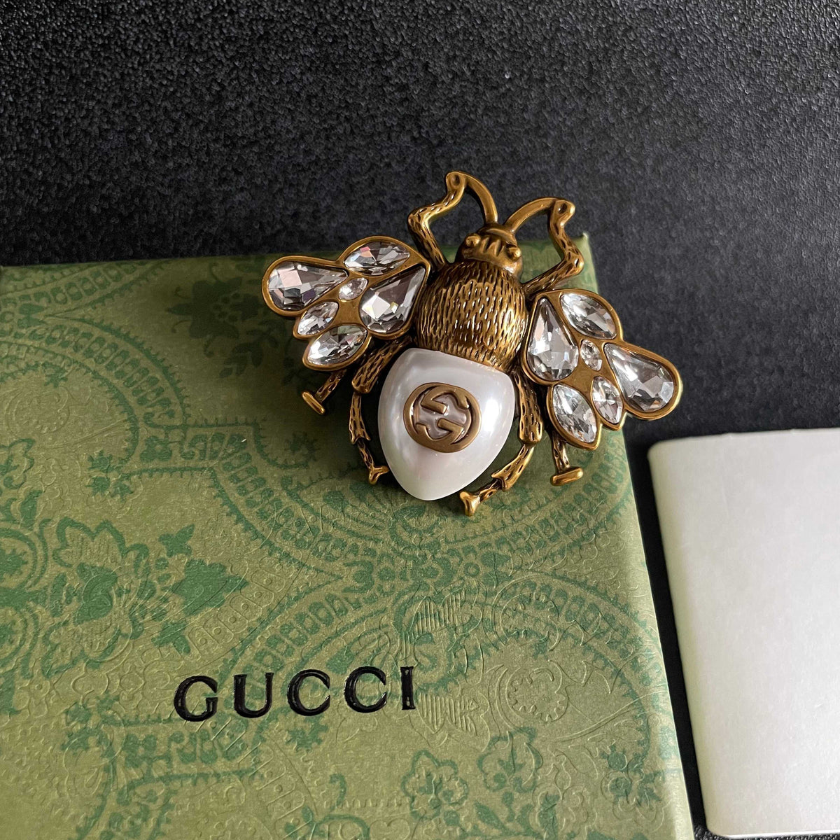 Martin Graham brooch in polished metal-tone – detail view