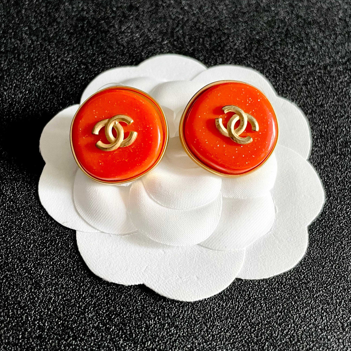 Martin Graham stud earrings in polished metal-tone – front product view