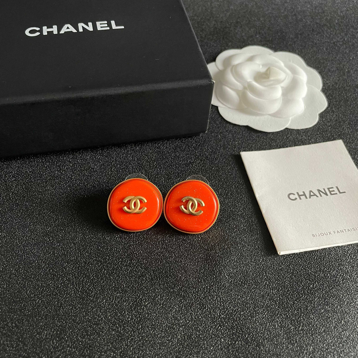 Martin Graham stud earrings in polished metal-tone – styled product view