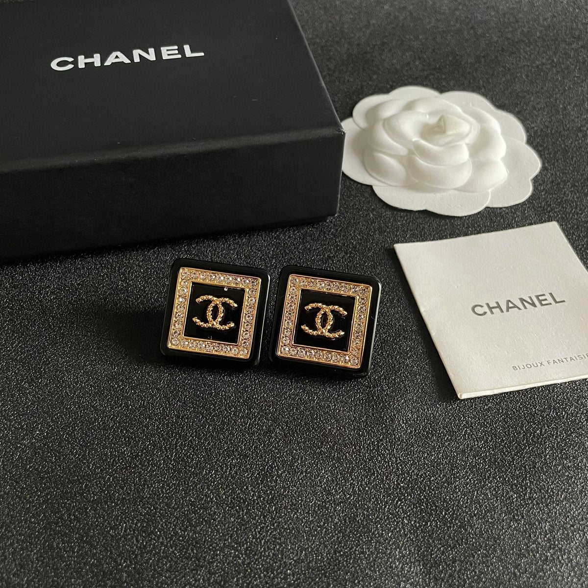 Martin Graham stud earrings in polished metal-tone – styled product view