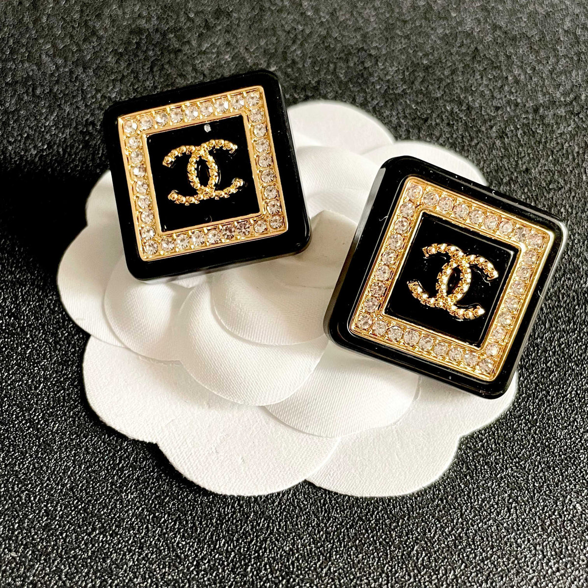 Martin Graham stud earrings in polished metal-tone – front product view