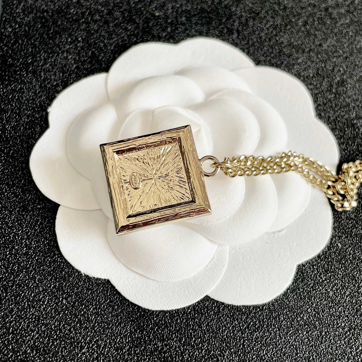 Martin Graham pendant necklace in polished metal-tone – front product view