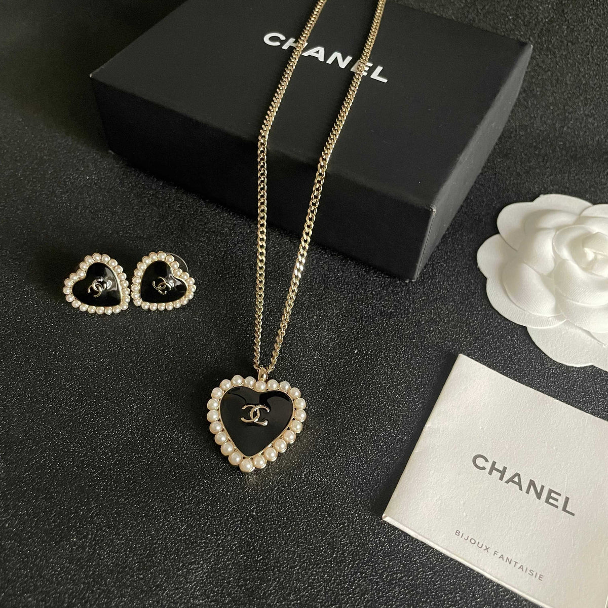 Martin Graham pendant necklace in polished metal-tone – close-up detail