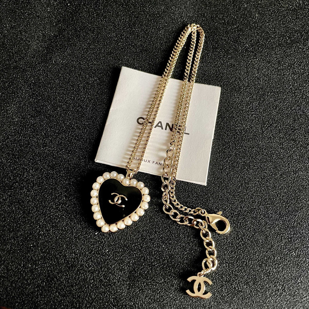 Martin Graham pendant necklace in polished metal-tone – detail view