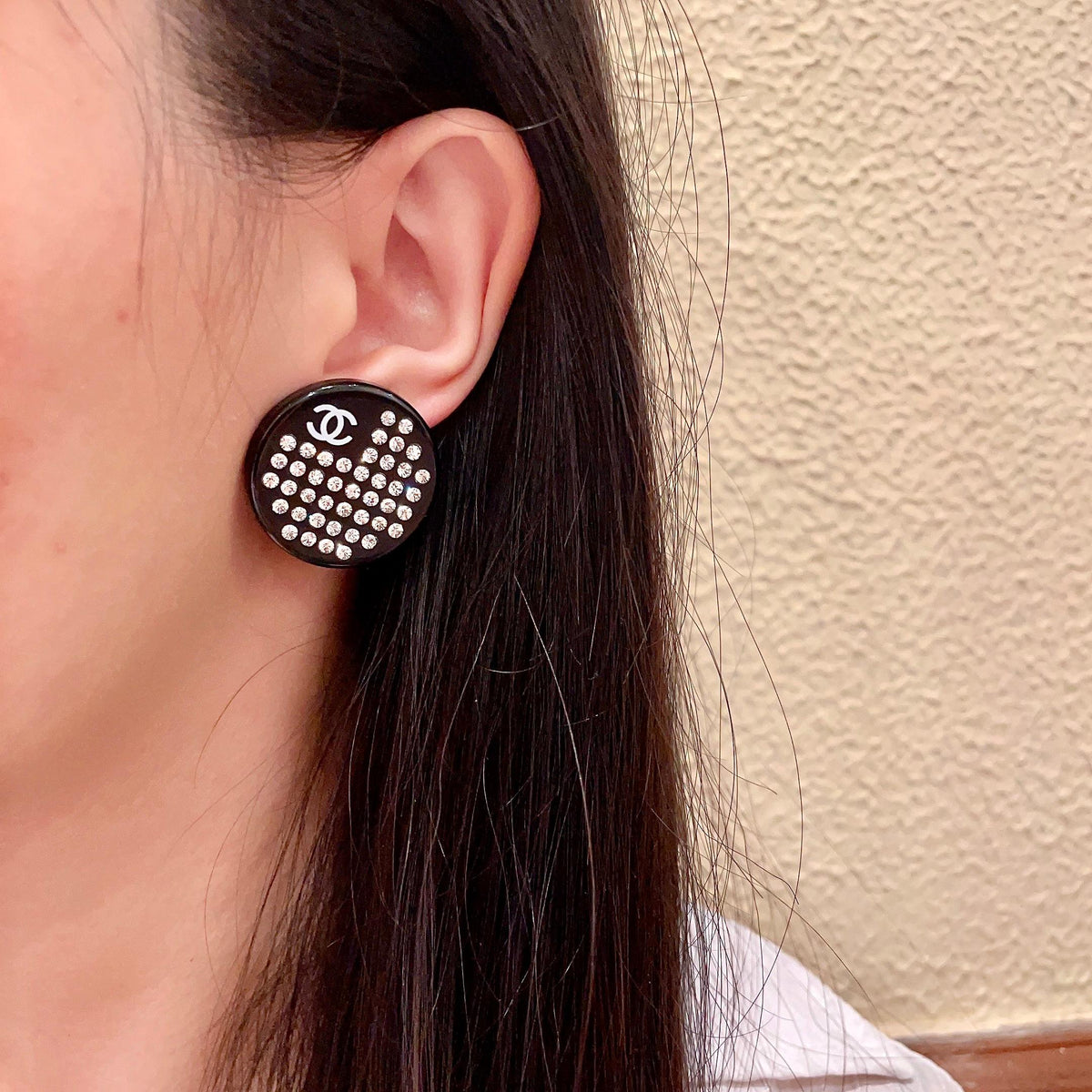 Martin Graham stud earrings in polished metal-tone – detail view