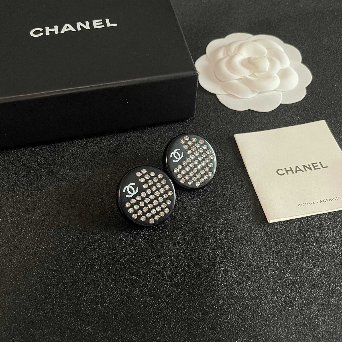 Martin Graham stud earrings in polished metal-tone – styled product view