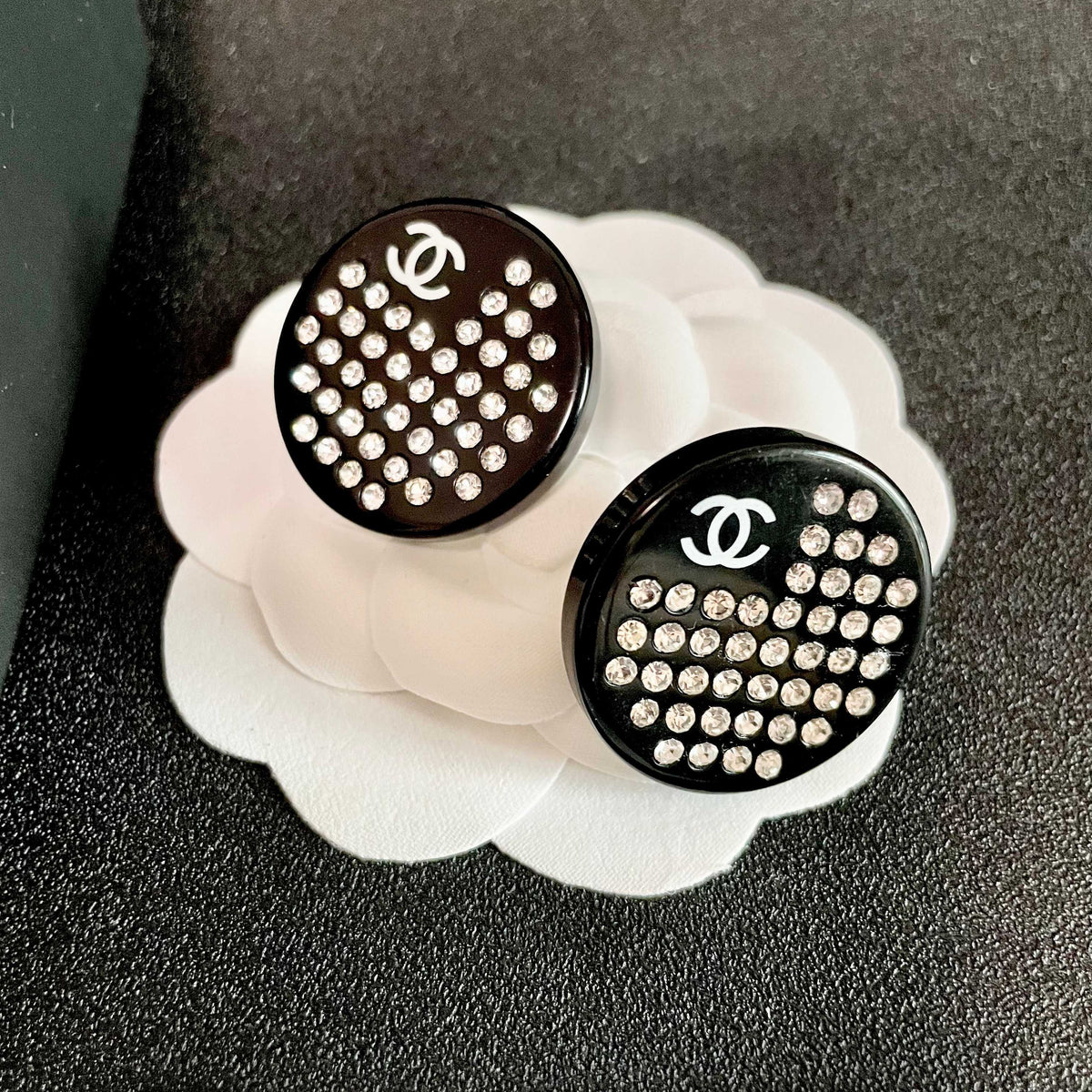 Martin Graham stud earrings in polished metal-tone – front product view