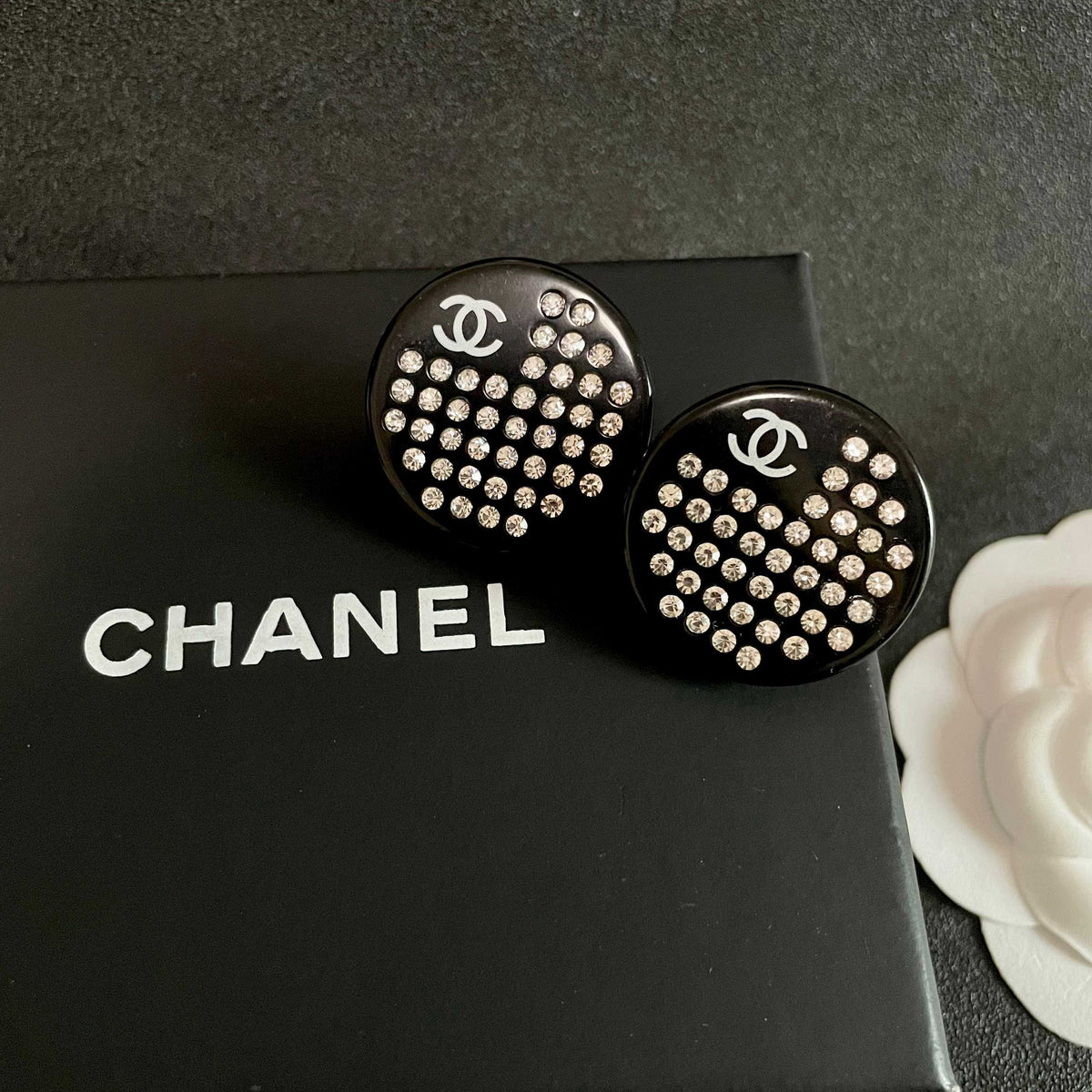 Martin Graham stud earrings in polished metal-tone – detail view