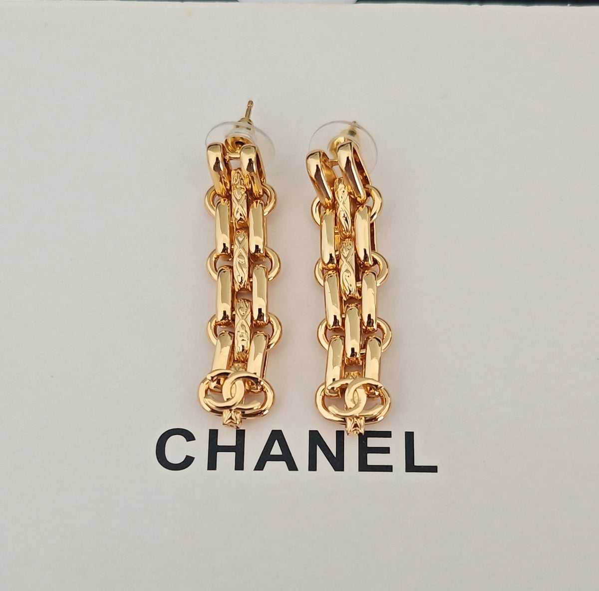Martin Graham earrings in polished metal-tone – side detail