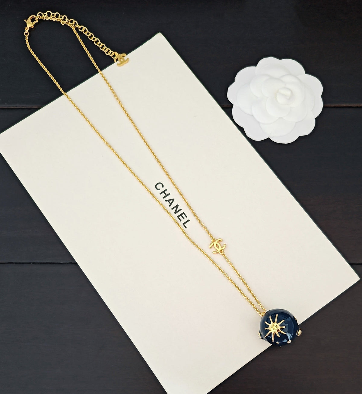 Martin Graham pendant necklace in polished metal-tone – front product view