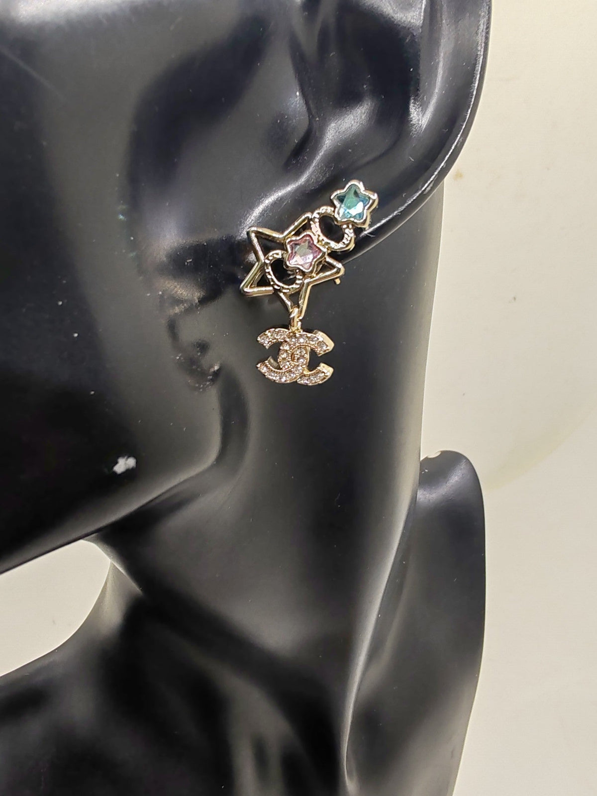 Martin Graham earrings in polished metal-tone – front product view