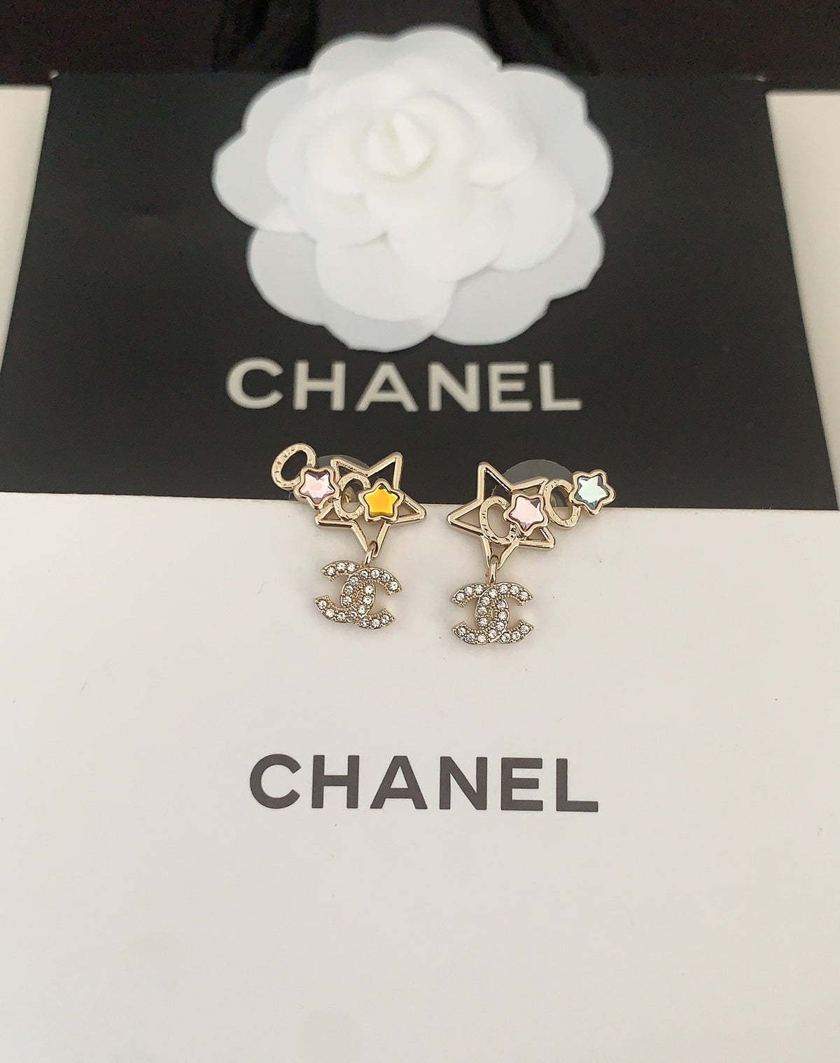 Martin Graham earrings in polished metal-tone – close-up detail