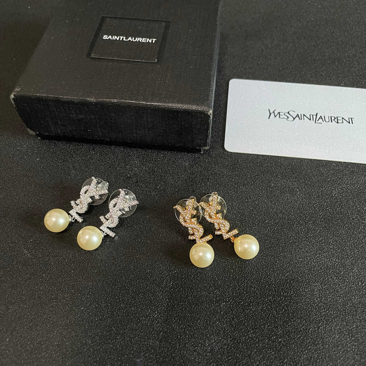 Martin Graham stud earrings in polished metal-tone – close-up detail