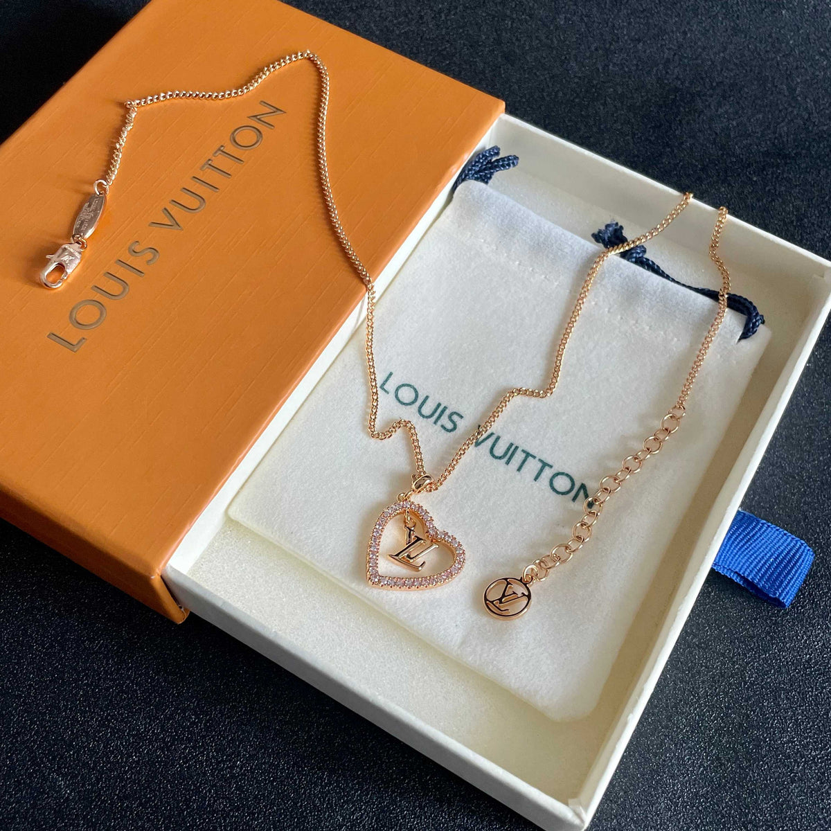 Martin Graham pendant necklace in polished metal-tone – detail view