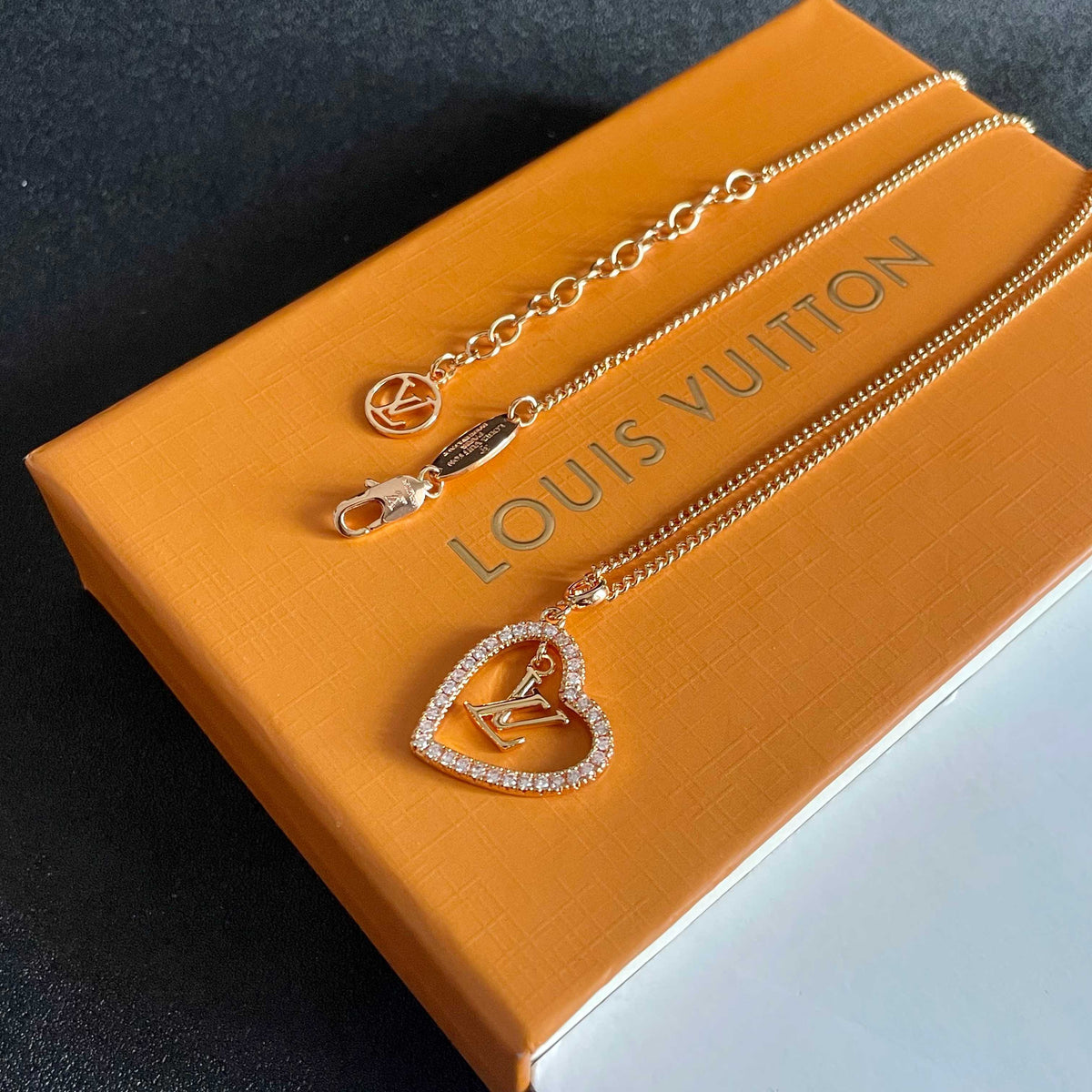 Martin Graham pendant necklace in polished metal-tone – styled product view