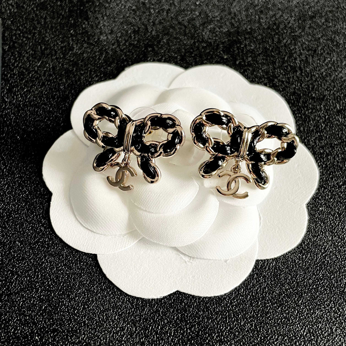 Martin Graham stud earrings in polished metal-tone – front product view