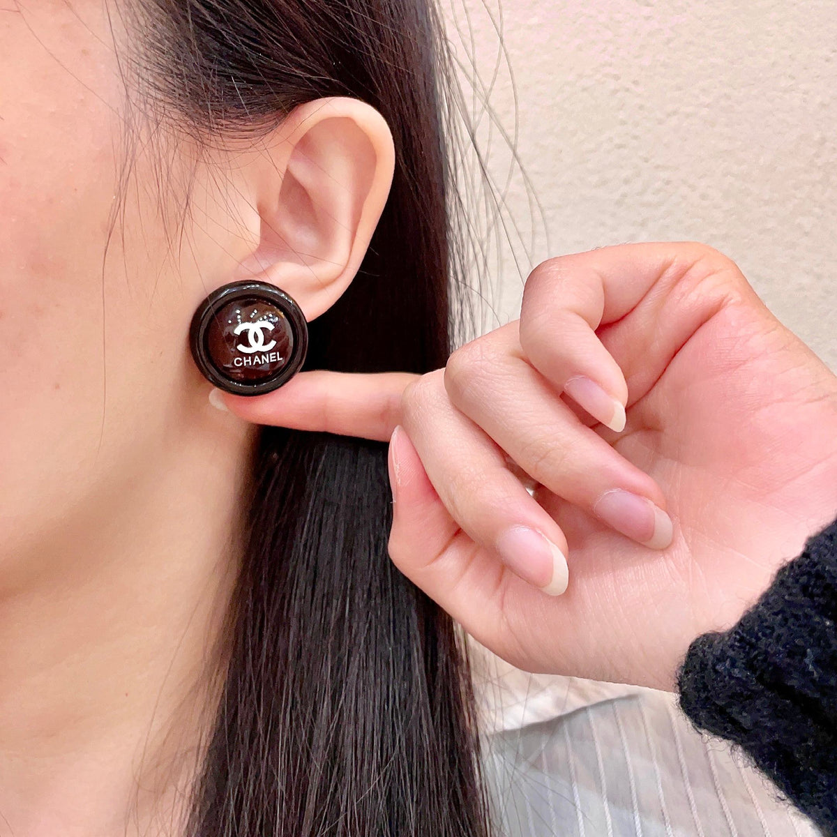 Martin Graham stud earrings in polished metal-tone – front product view