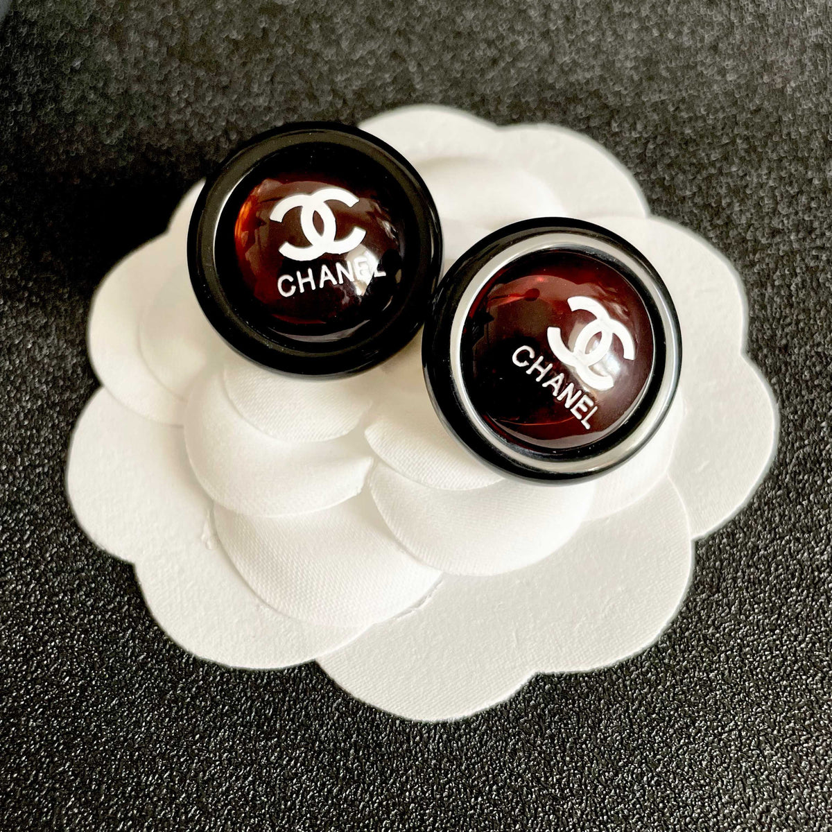 Martin Graham stud earrings in polished metal-tone – front product view