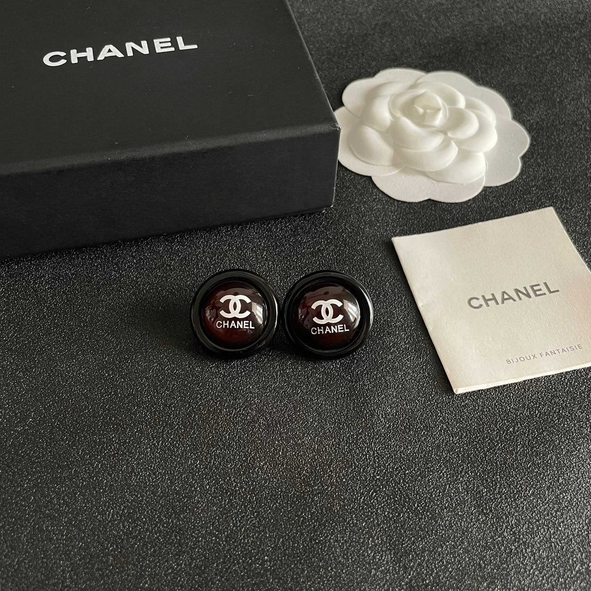 Martin Graham stud earrings in polished metal-tone – styled product view