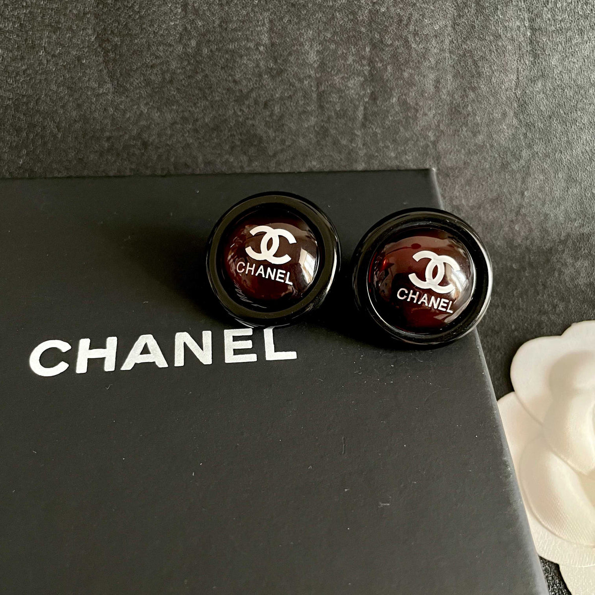 Martin Graham stud earrings in polished metal-tone – detail view
