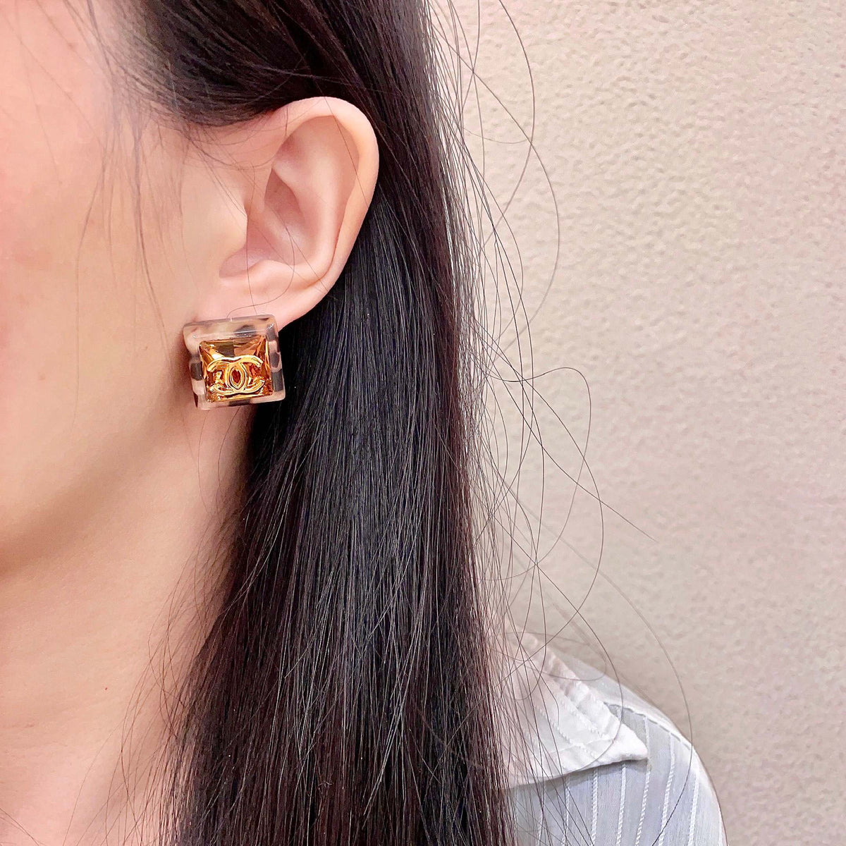 Martin Graham stud earrings in polished metal-tone – detail view