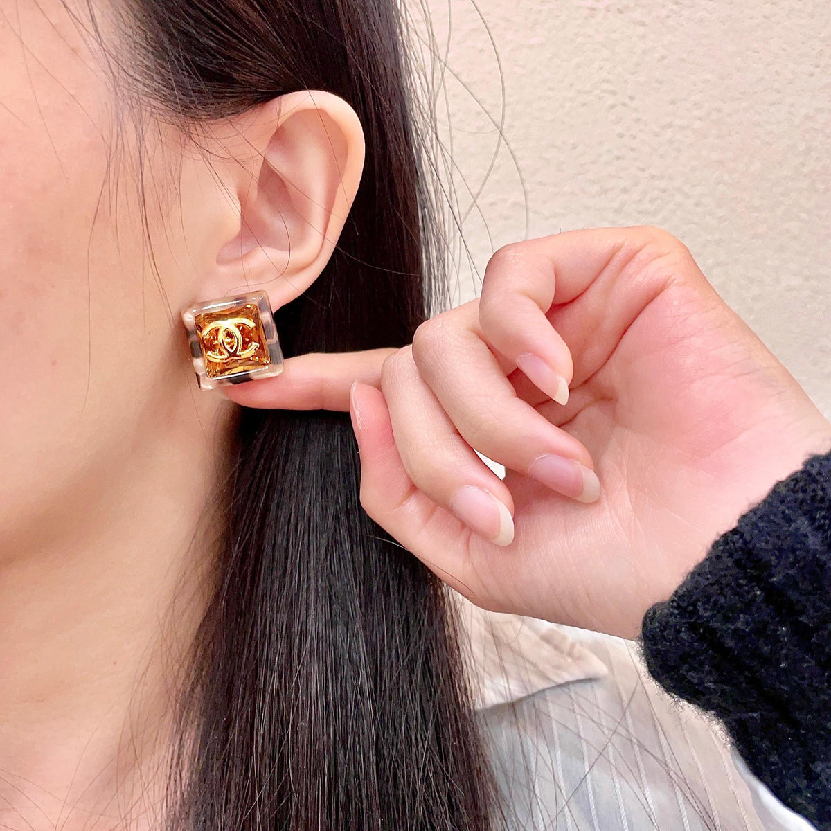 Martin Graham stud earrings in polished metal-tone – front product view