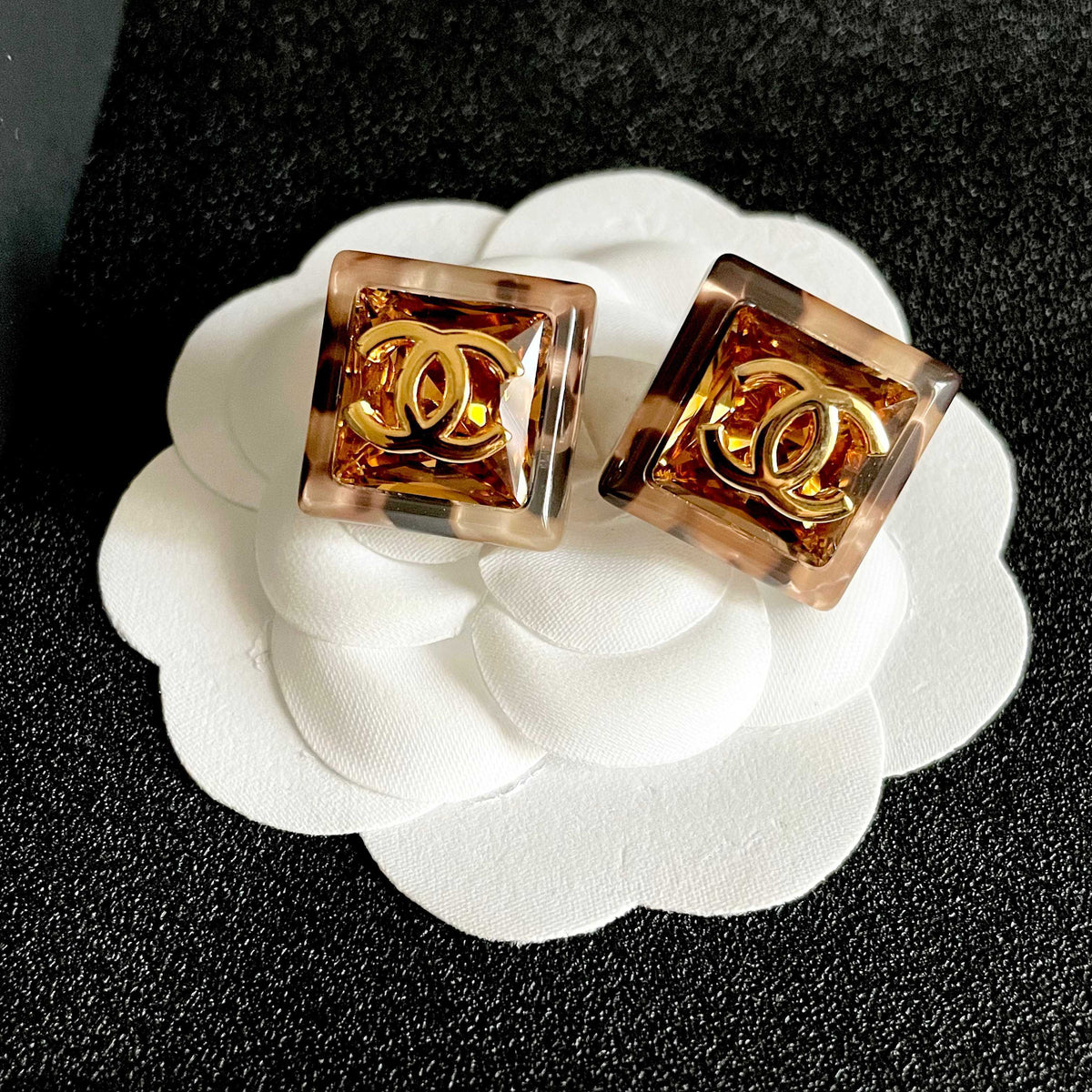 Martin Graham stud earrings in polished metal-tone – front product view