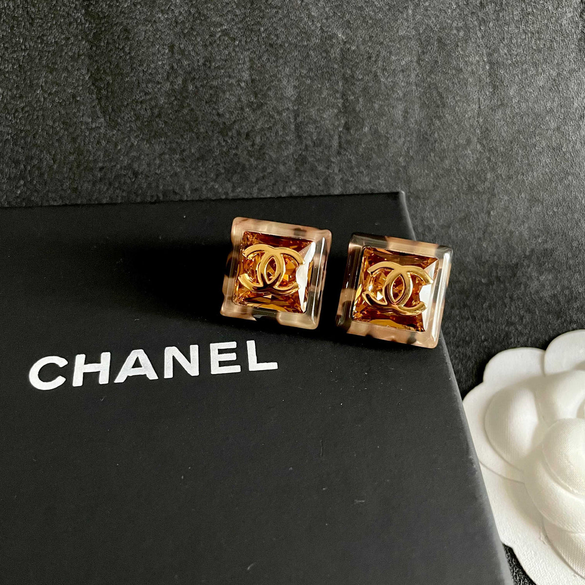 Martin Graham stud earrings in polished metal-tone – detail view