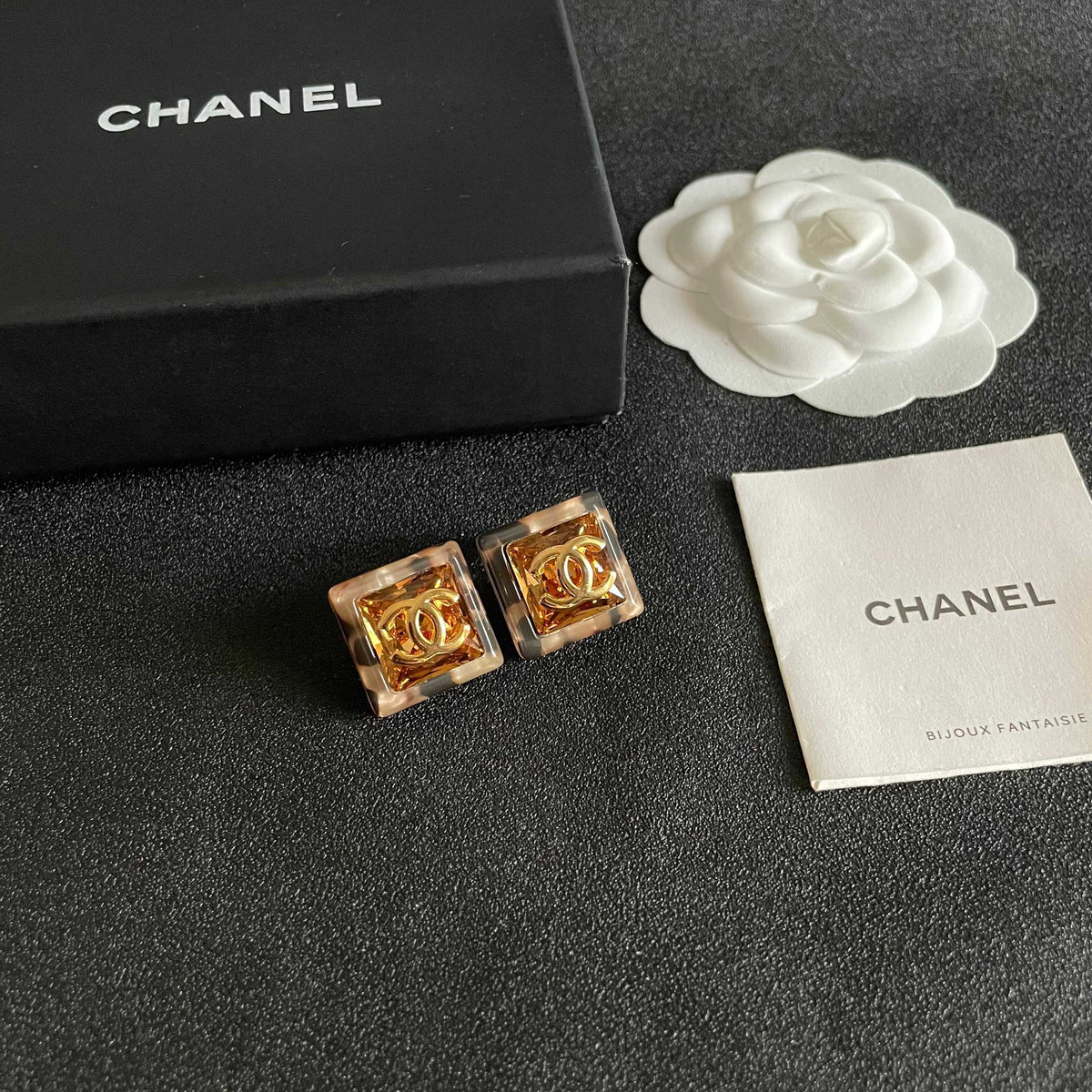 Martin Graham stud earrings in polished metal-tone – styled product view