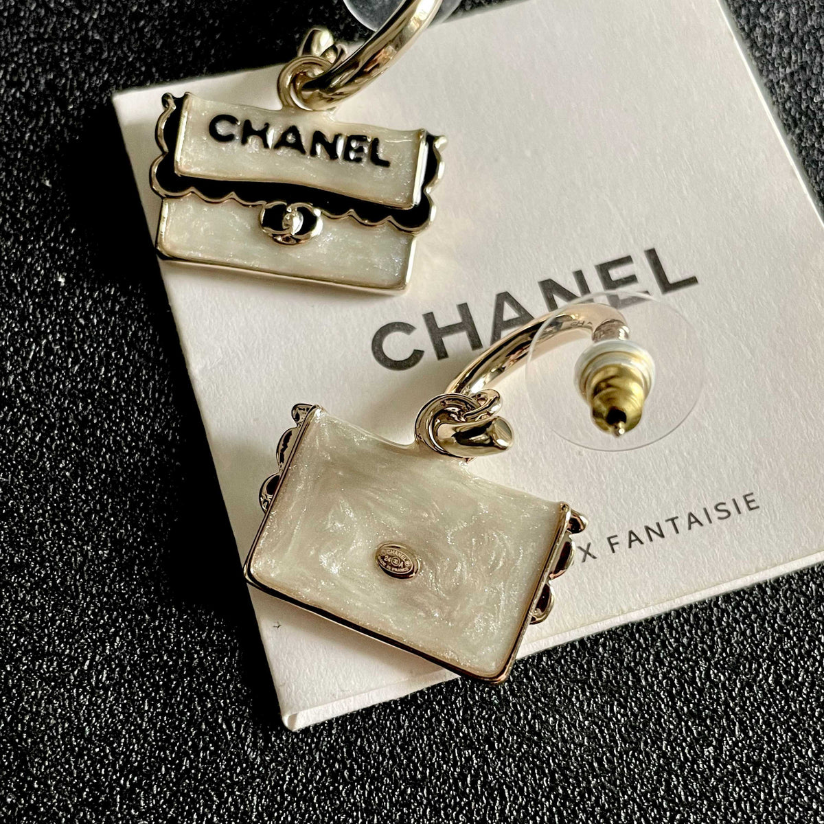 Martin Graham stud earrings in polished metal-tone – main product view