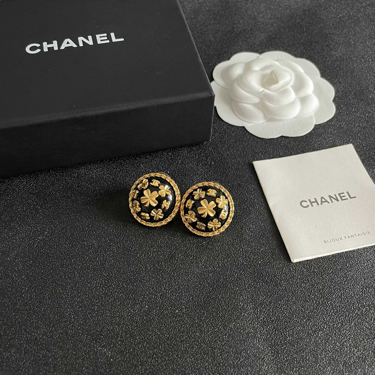 Martin Graham stud earrings in polished metal-tone – styled product view