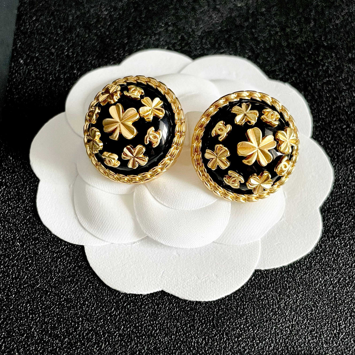Martin Graham stud earrings in polished metal-tone – front product view