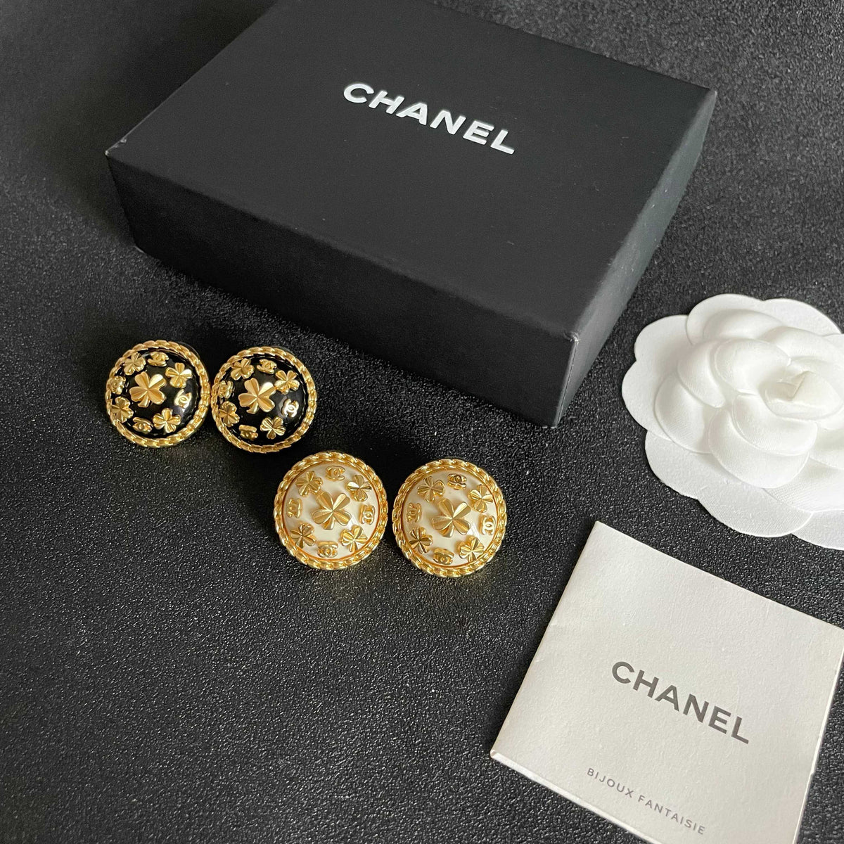 Martin Graham stud earrings in polished metal-tone – side detail
