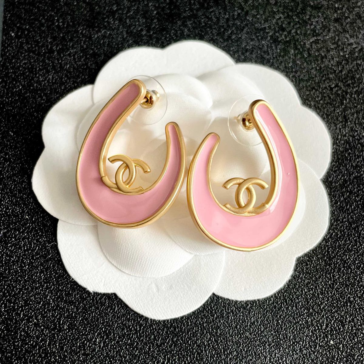 Martin Graham stud earrings in polished metal-tone – front product view