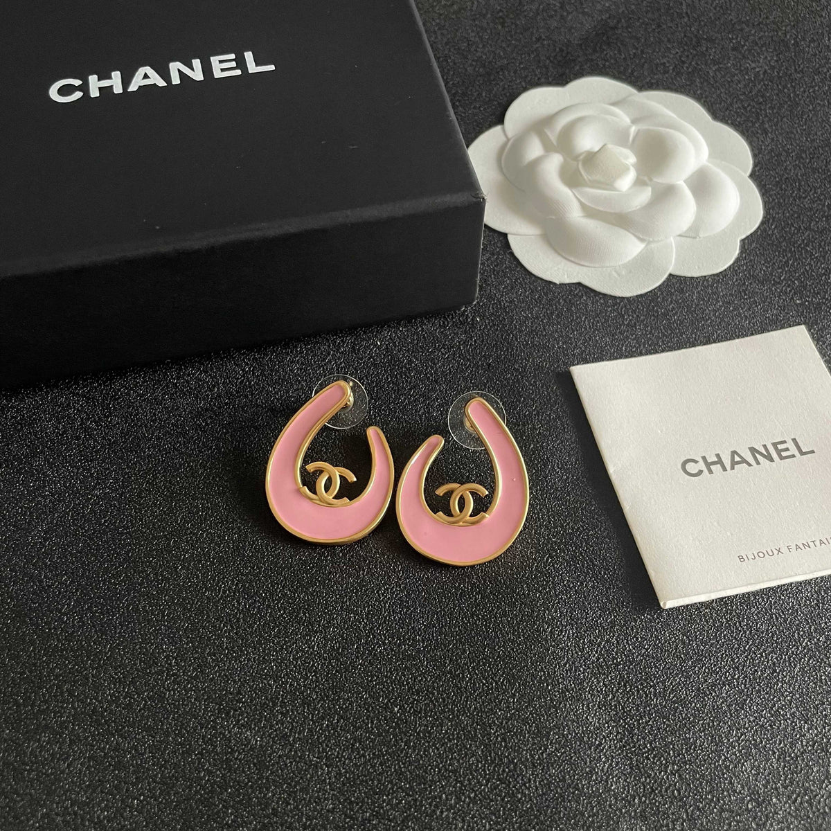Martin Graham stud earrings in polished metal-tone – styled product view