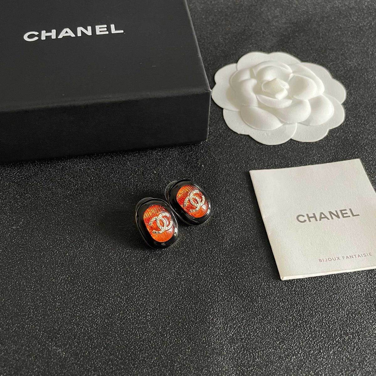 Martin Graham stud earrings in polished metal-tone – styled product view