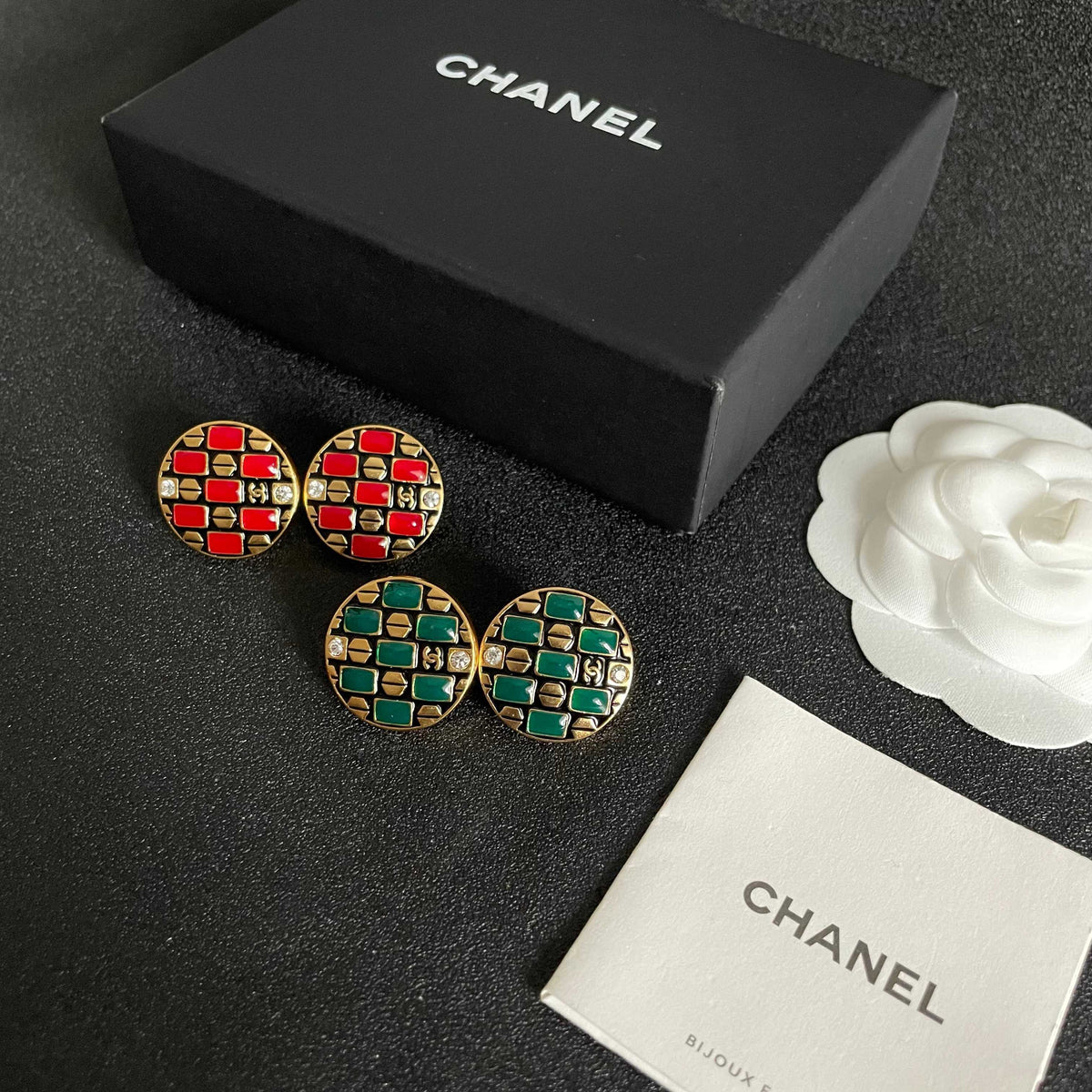 Martin Graham stud earrings in polished metal-tone – close-up detail