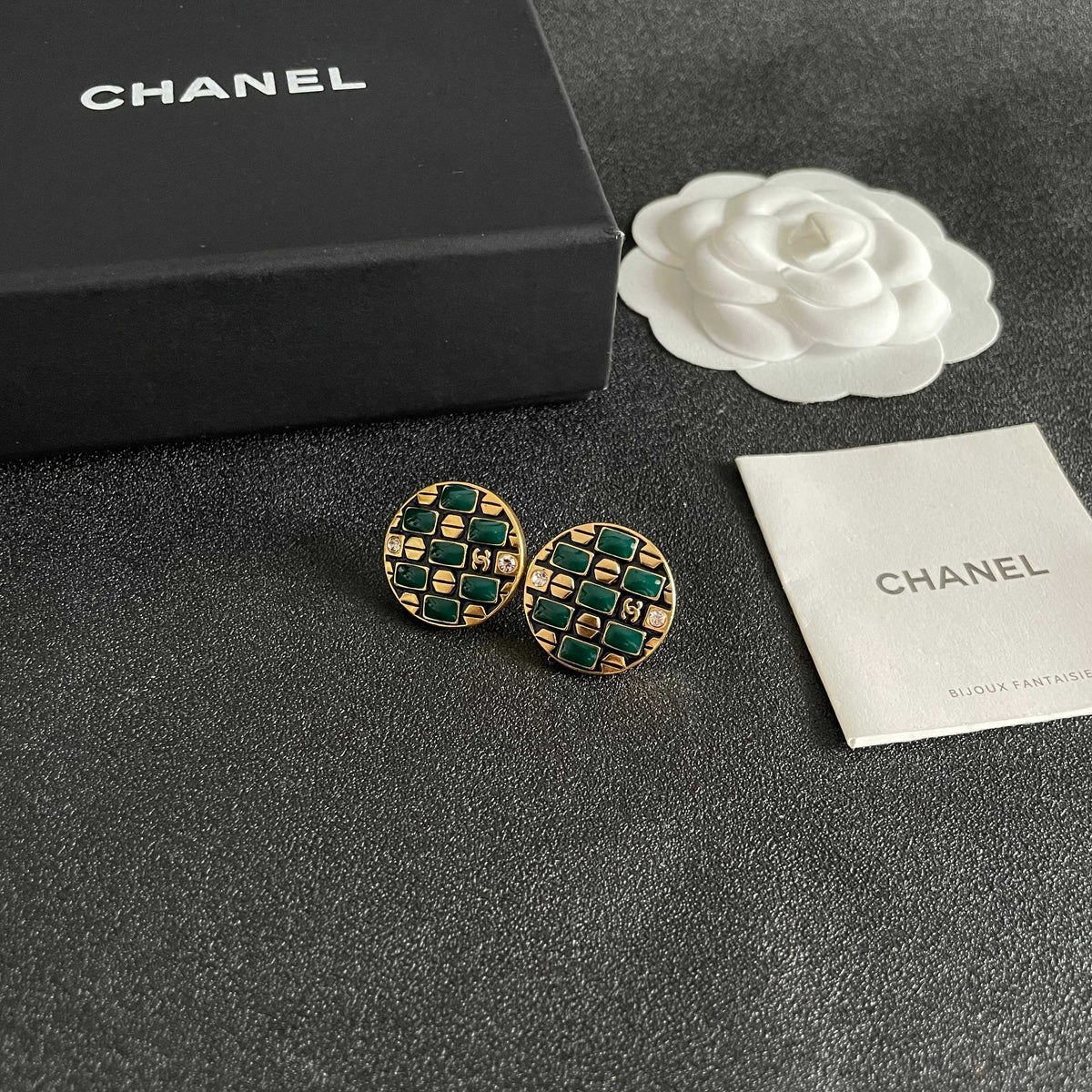 Martin Graham stud earrings in polished metal-tone – styled product view
