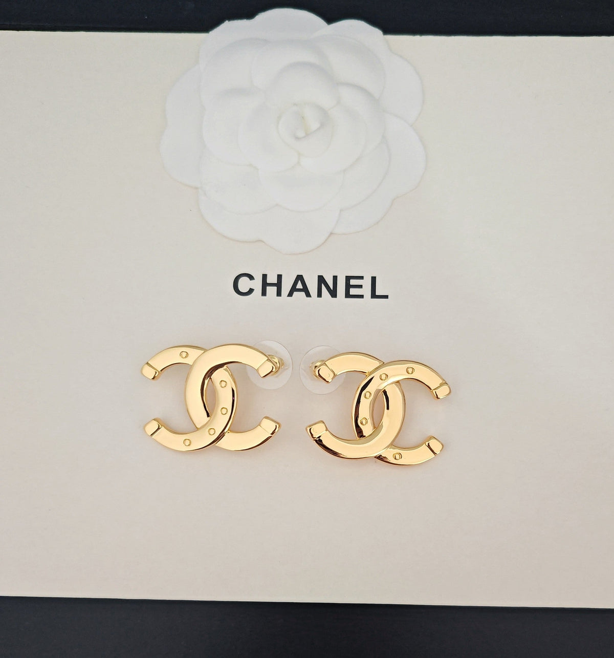 Martin Graham stud earrings in polished metal-tone – main product view