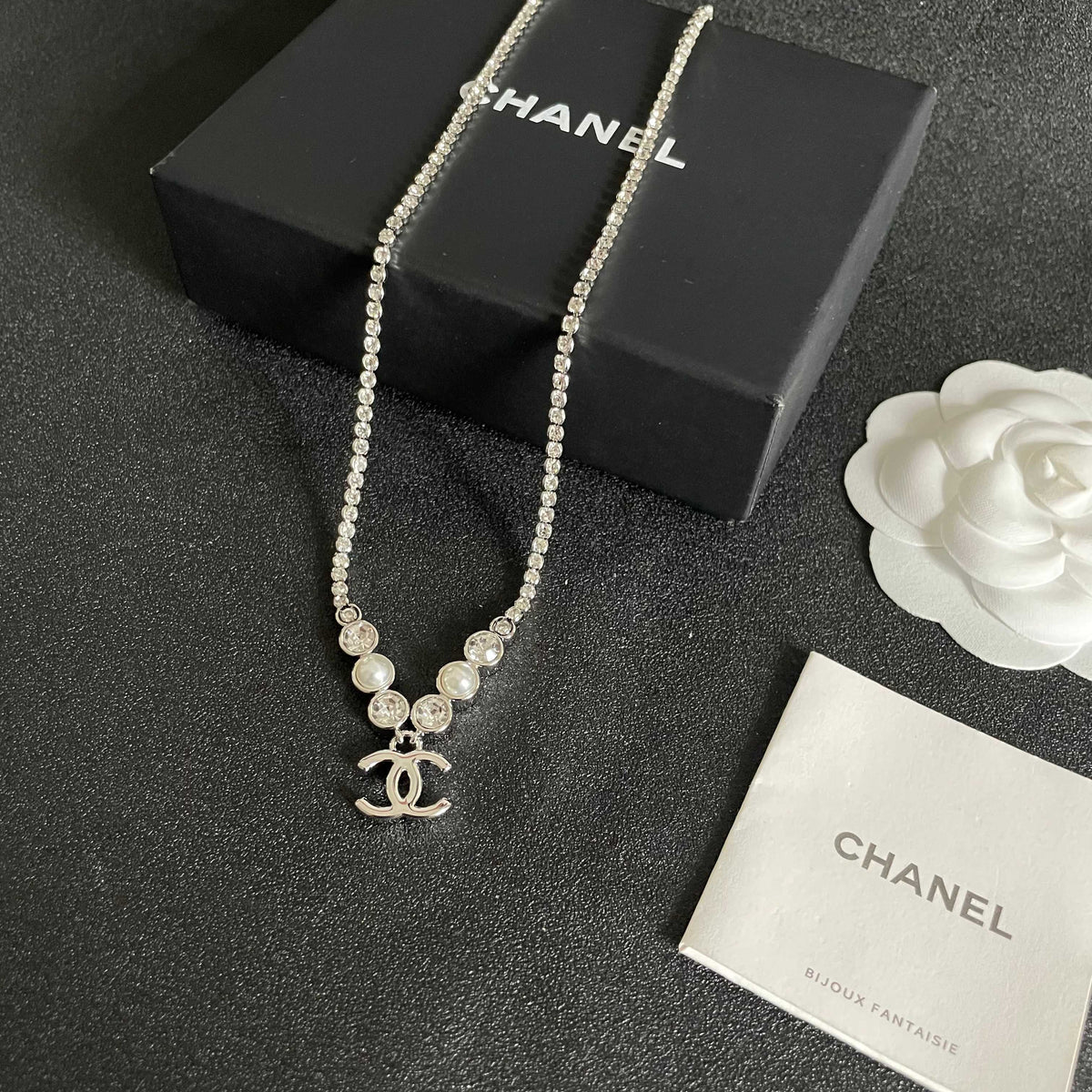Martin Graham pendant necklace in polished metal-tone – close-up detail
