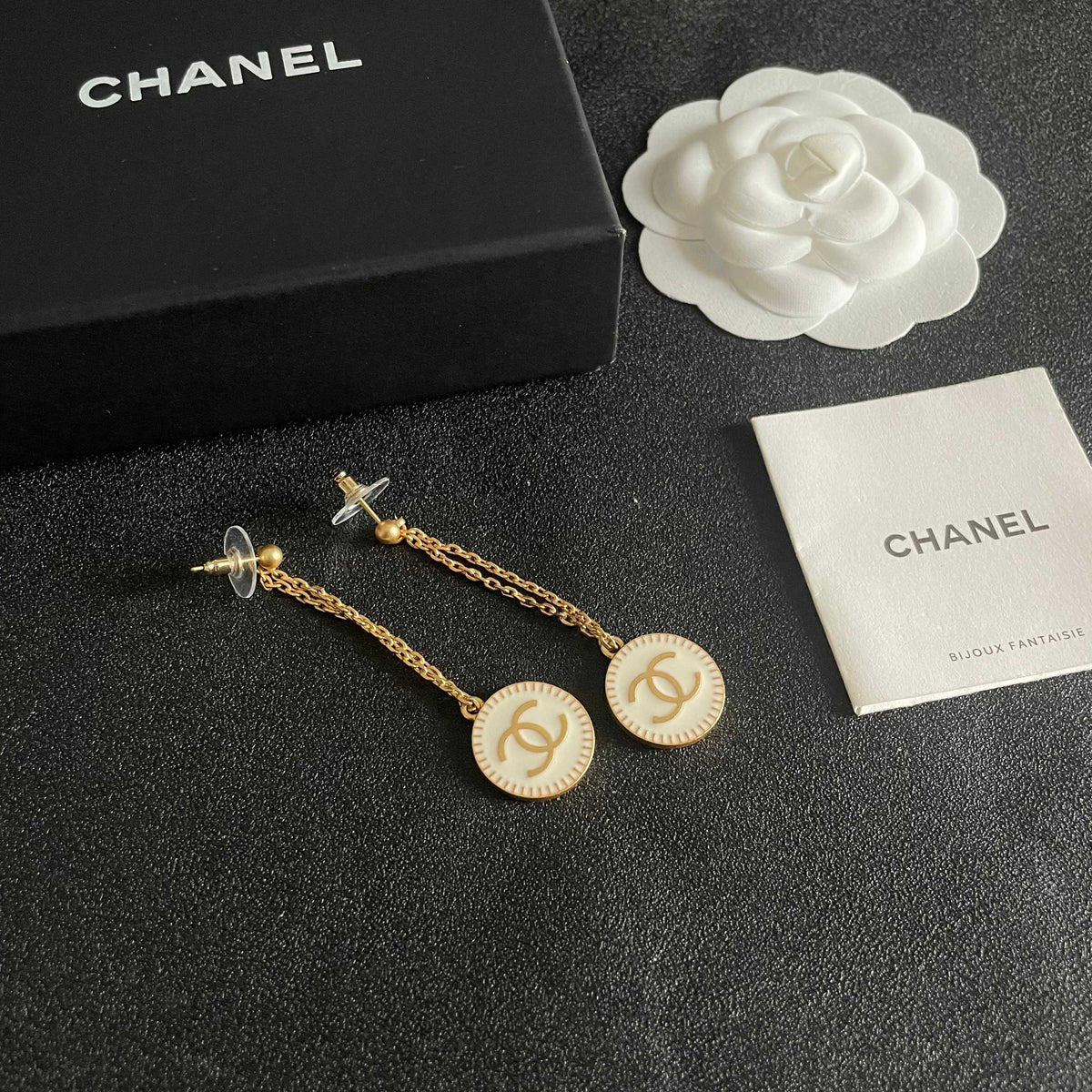 Martin Graham earrings in polished metal-tone – close-up detail