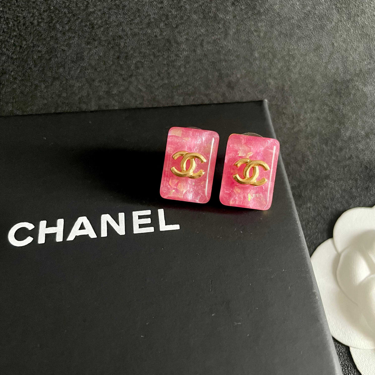 Martin Graham stud earrings in polished metal-tone – detail view