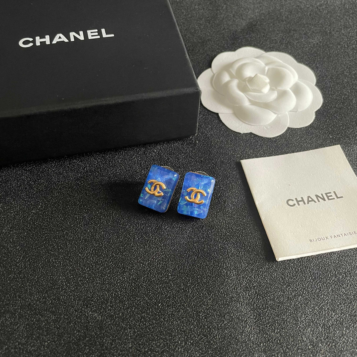Martin Graham stud earrings in polished metal-tone – styled product view