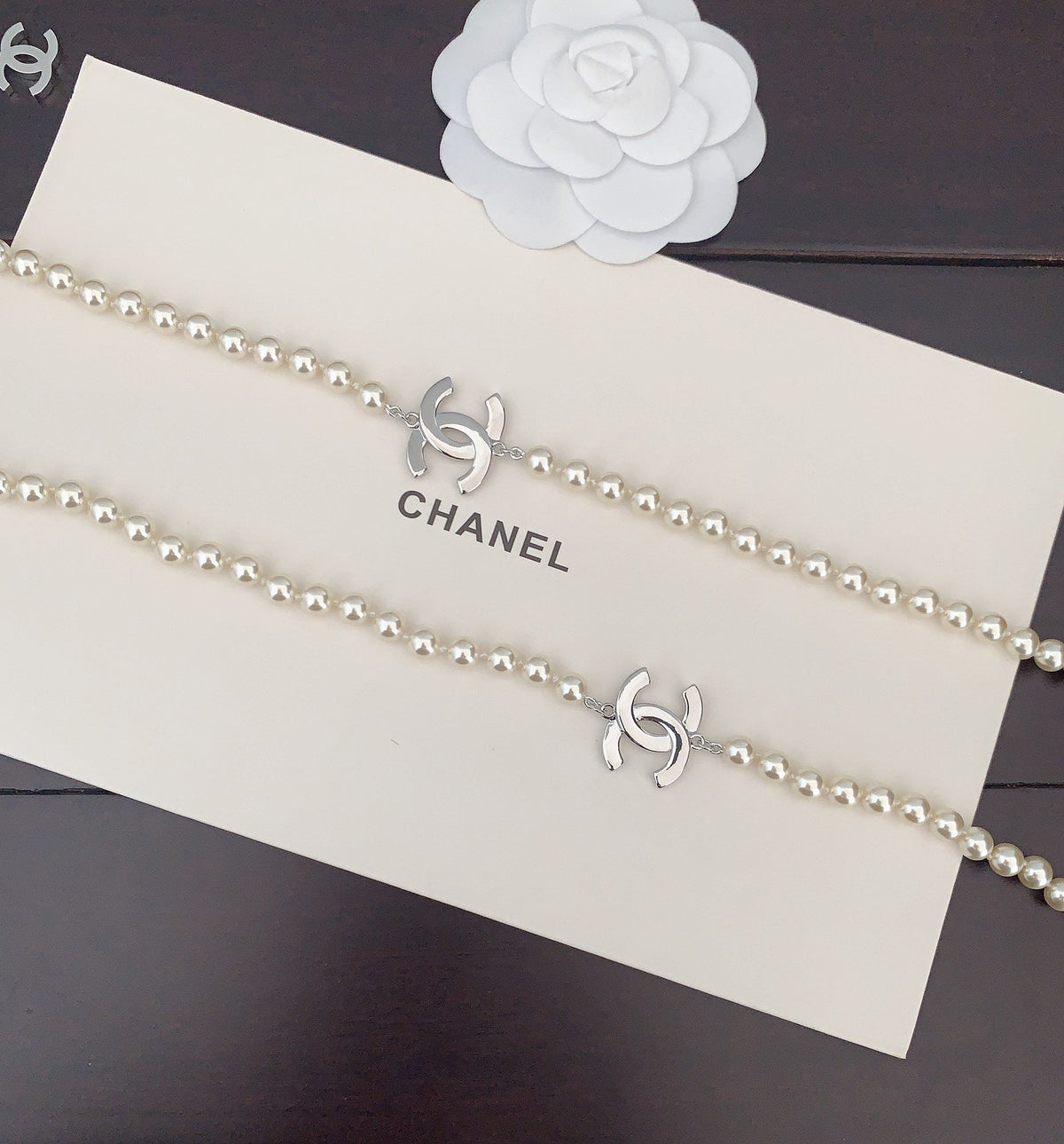 Martin Graham pendant necklace in polished metal-tone – close-up detail
