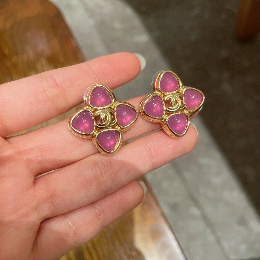 Martin Graham stud earrings in polished metal-tone – side detail