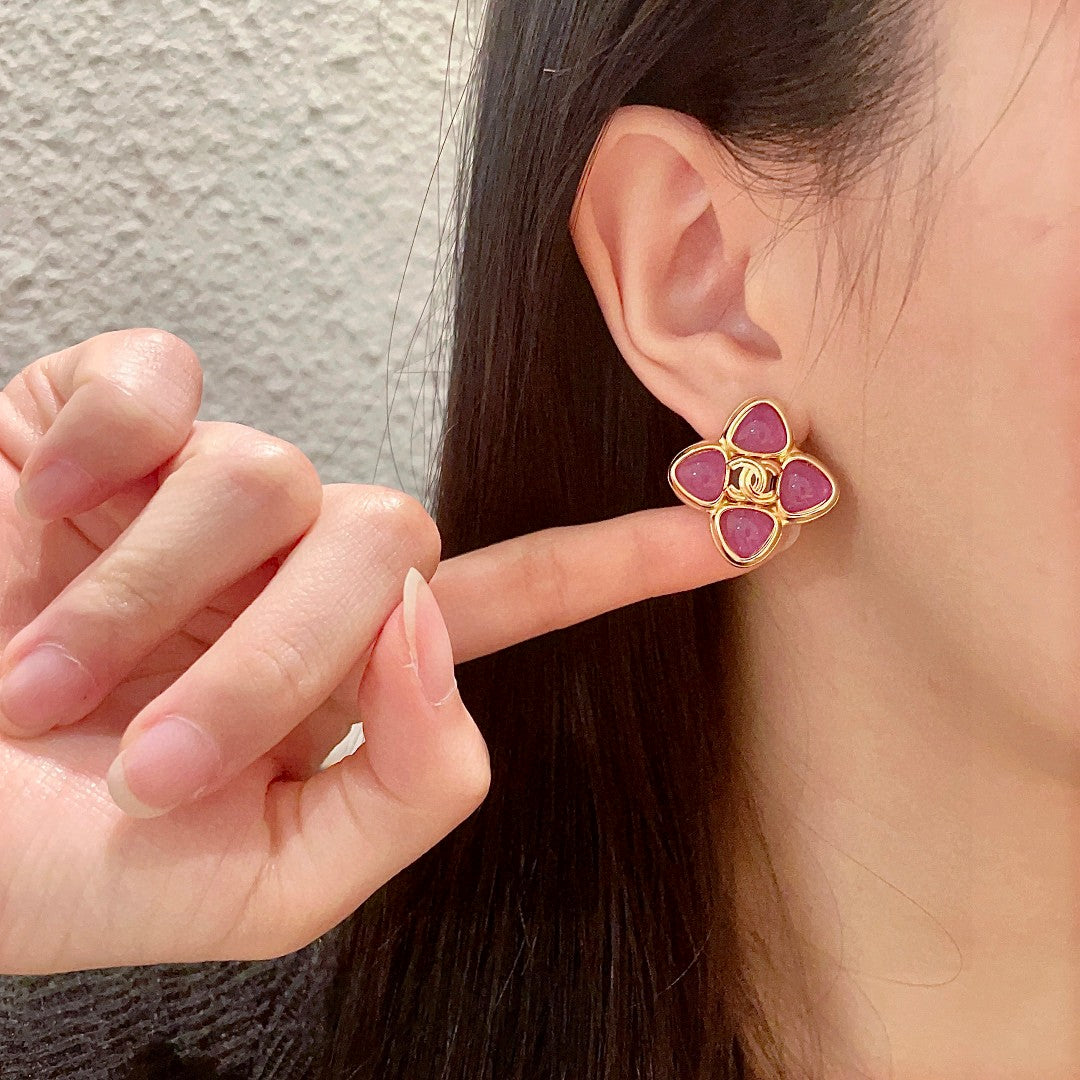 Martin Graham stud earrings in polished metal-tone – front product view