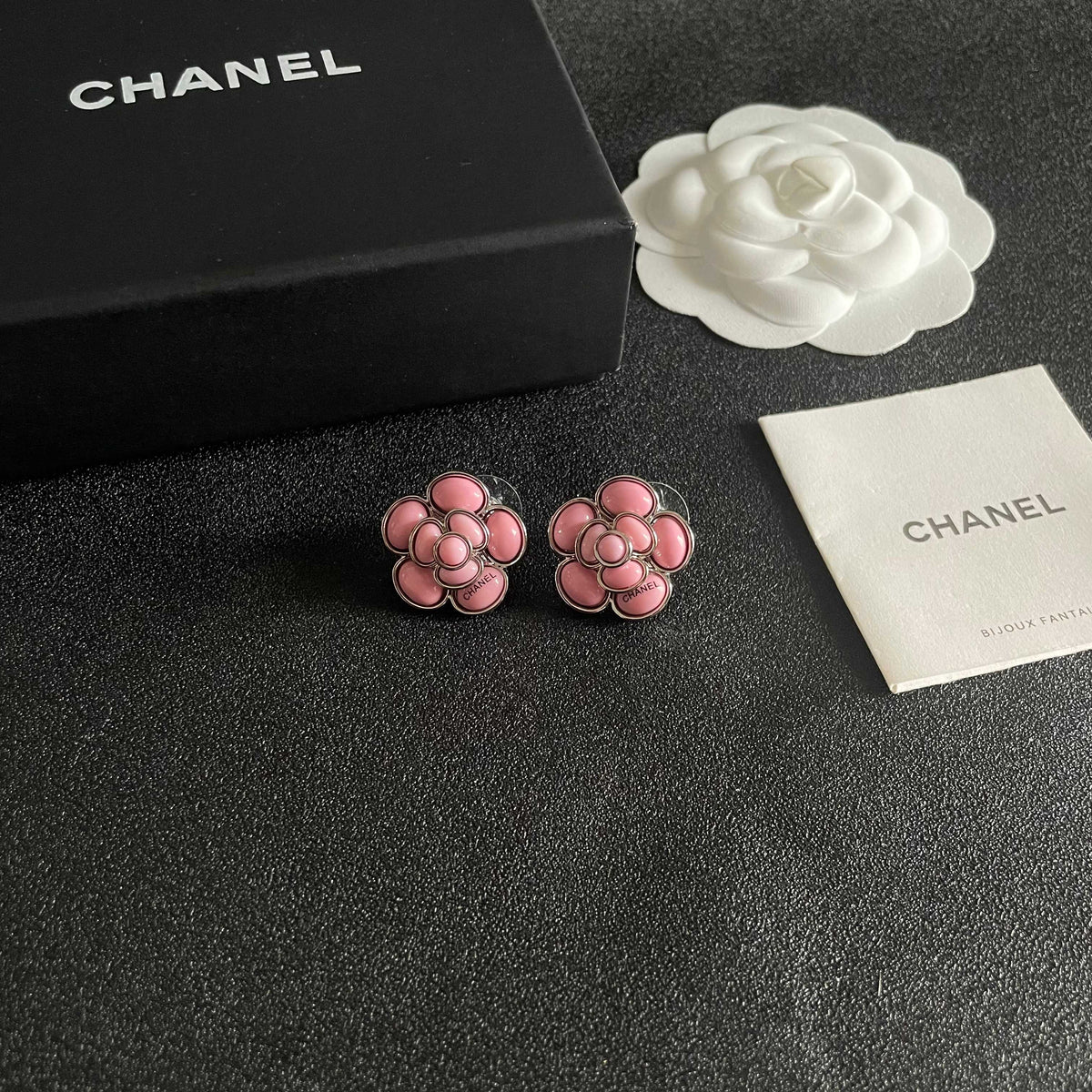 Martin Graham stud earrings in polished metal-tone – styled product view