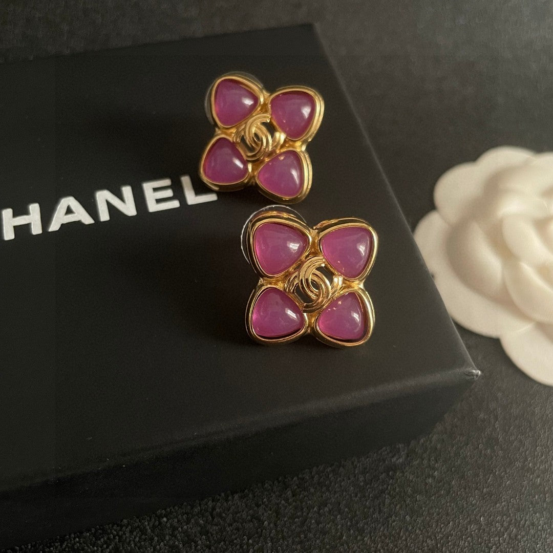 Martin Graham stud earrings in polished metal-tone – detail view