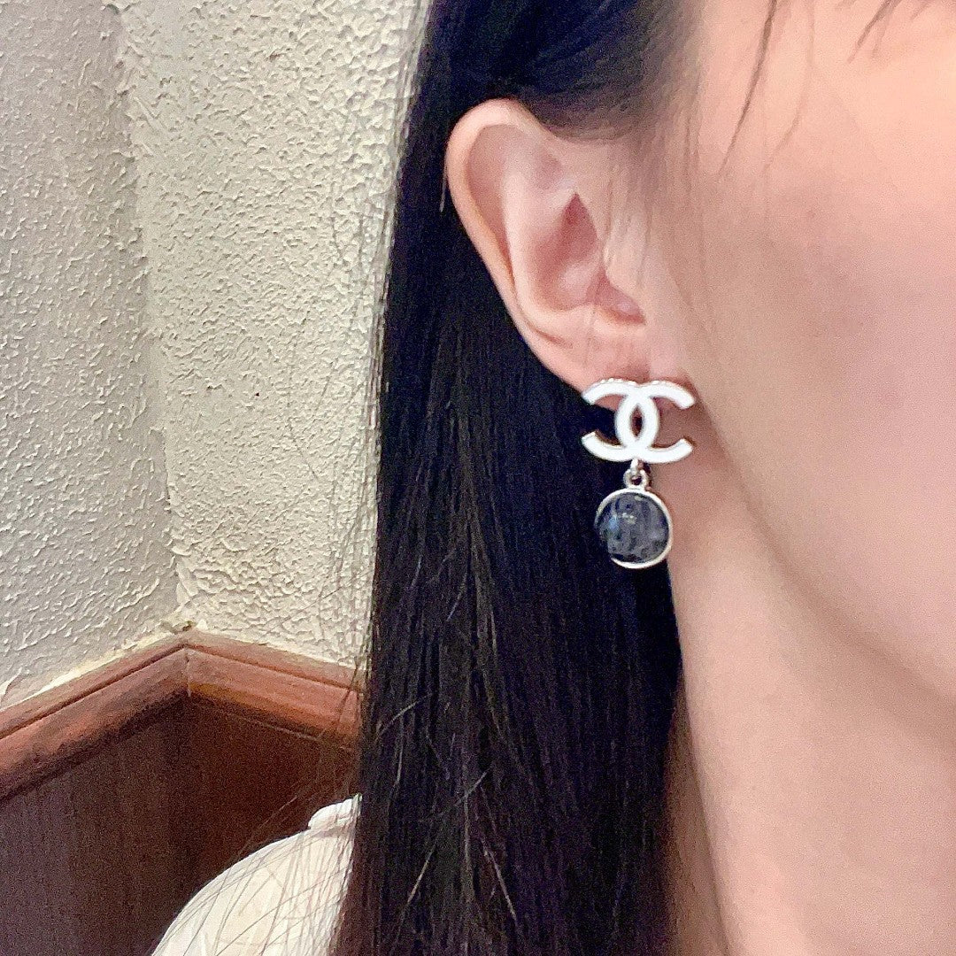 Martin Graham earrings in polished metal-tone – detail view
