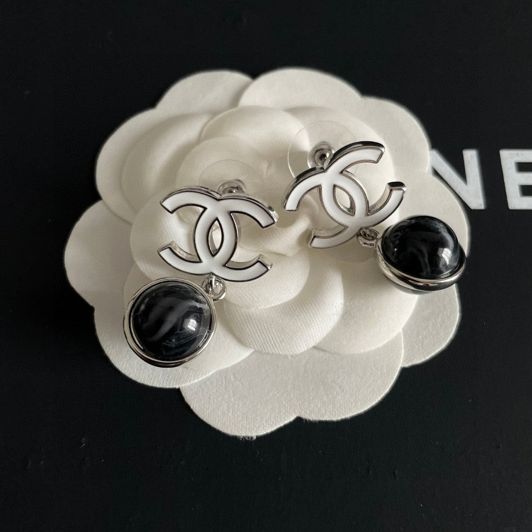 Martin Graham earrings in polished metal-tone – styled product view